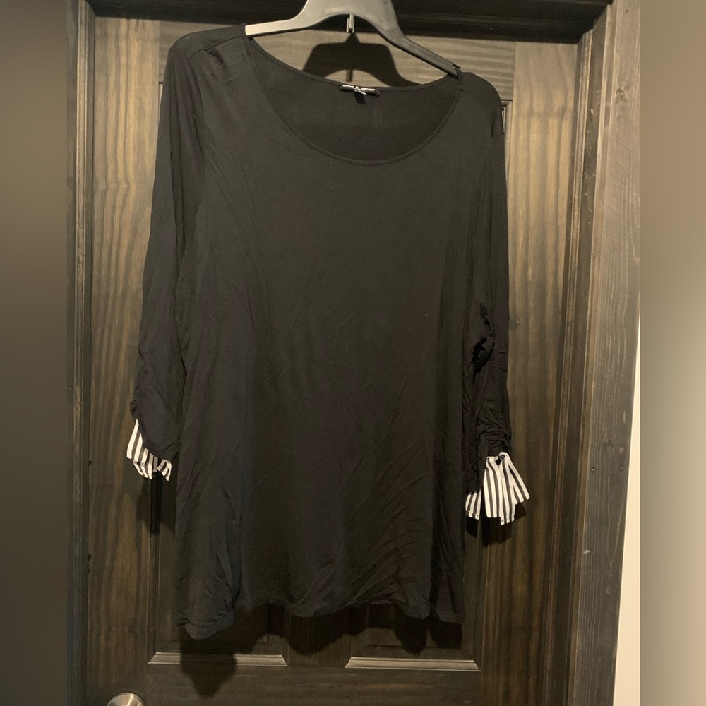 Black top with tie sleeves.